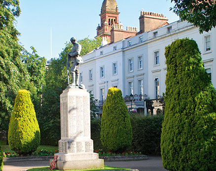 park scene looking high up to statue