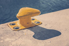 close-up of boat mooring hook in harbour